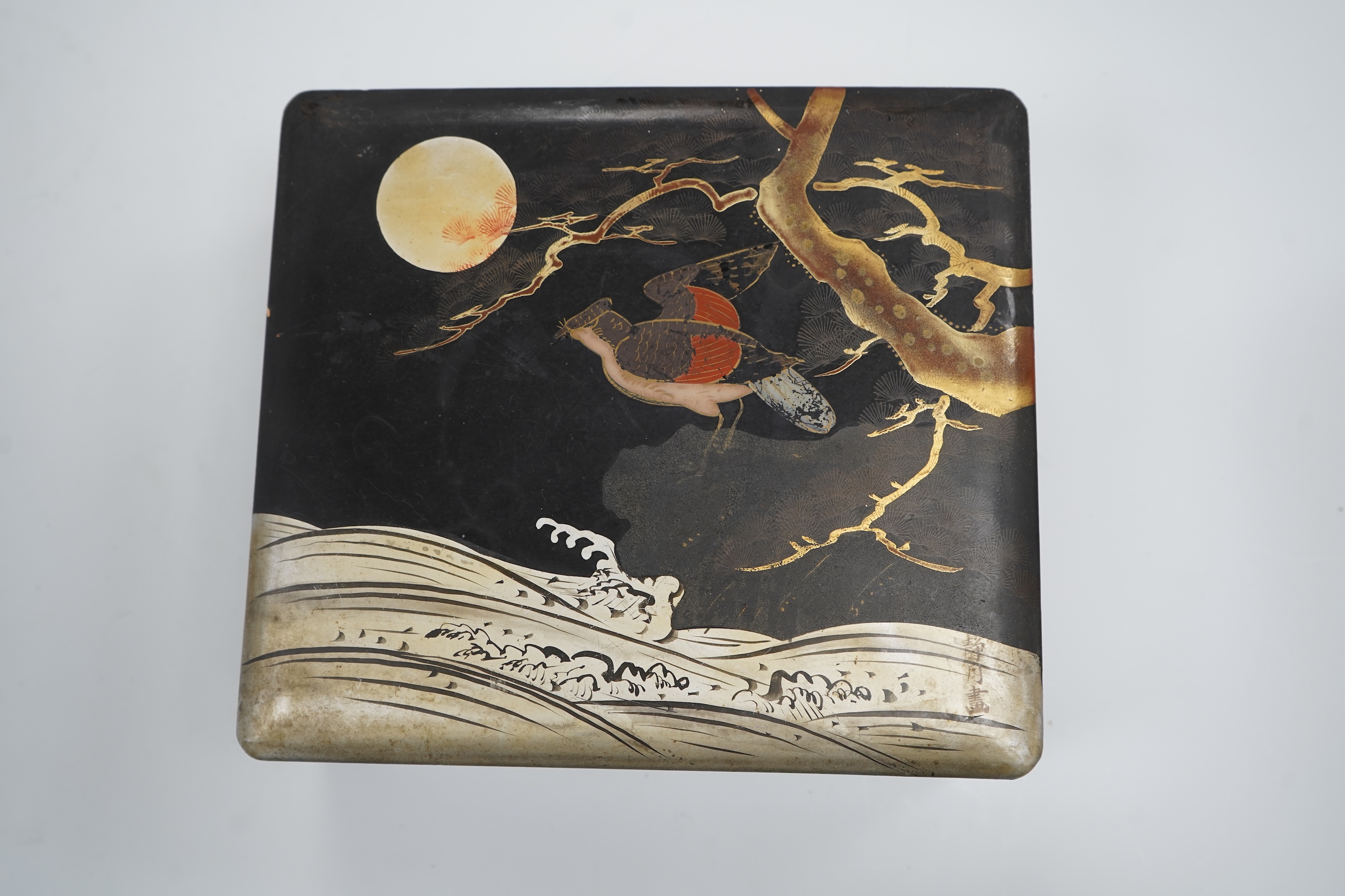 A group of costume jewellery and collector's items in a Japanese lacquer box